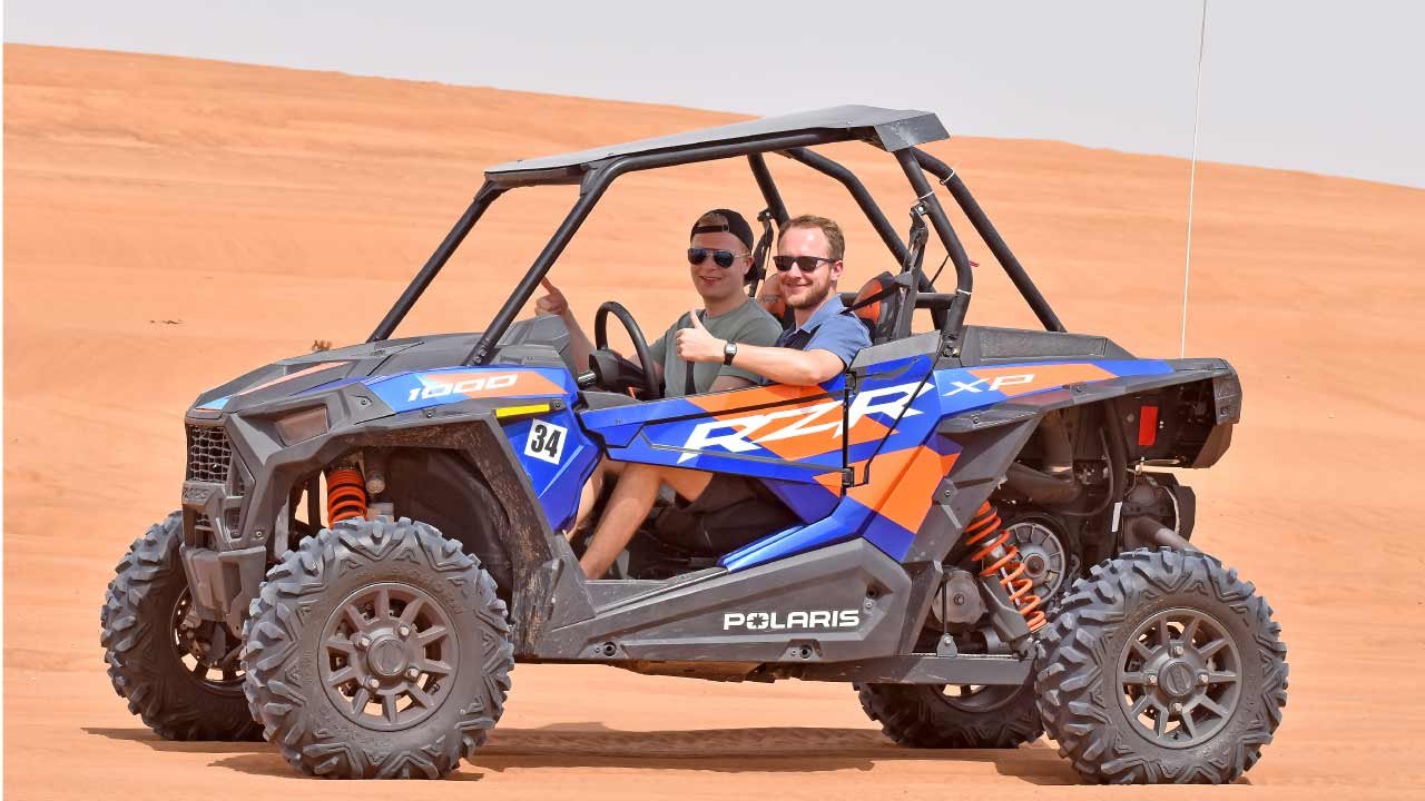 Can-Am Maverick X3 two-seater dune buggy in Dubai desert